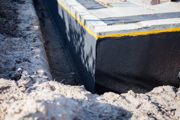 Professional Basement Waterproofing technician working in Sevierville, TN